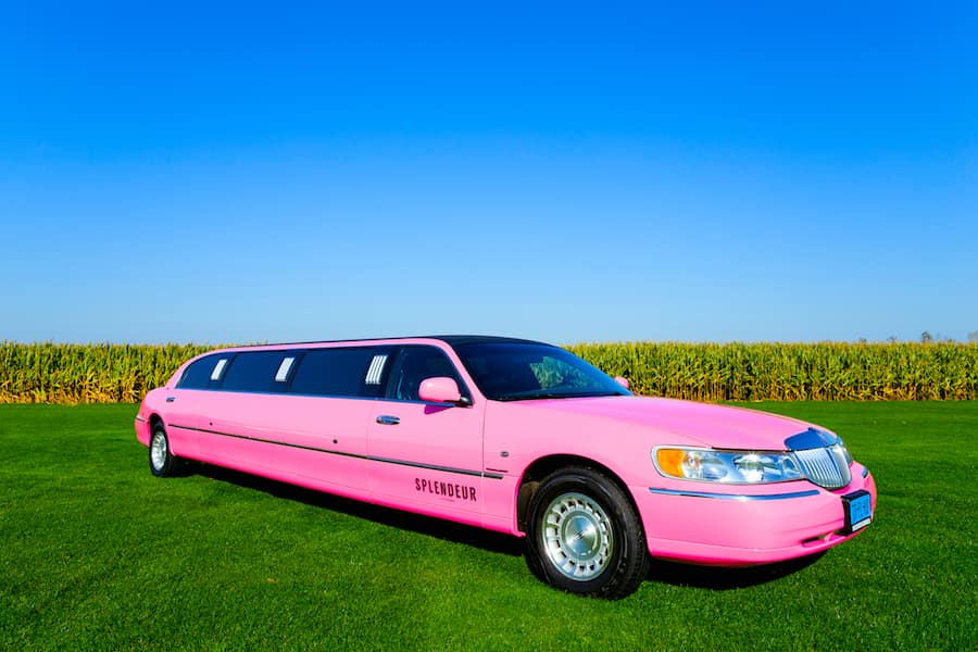 Lincoln (roze) Roze limousine huren